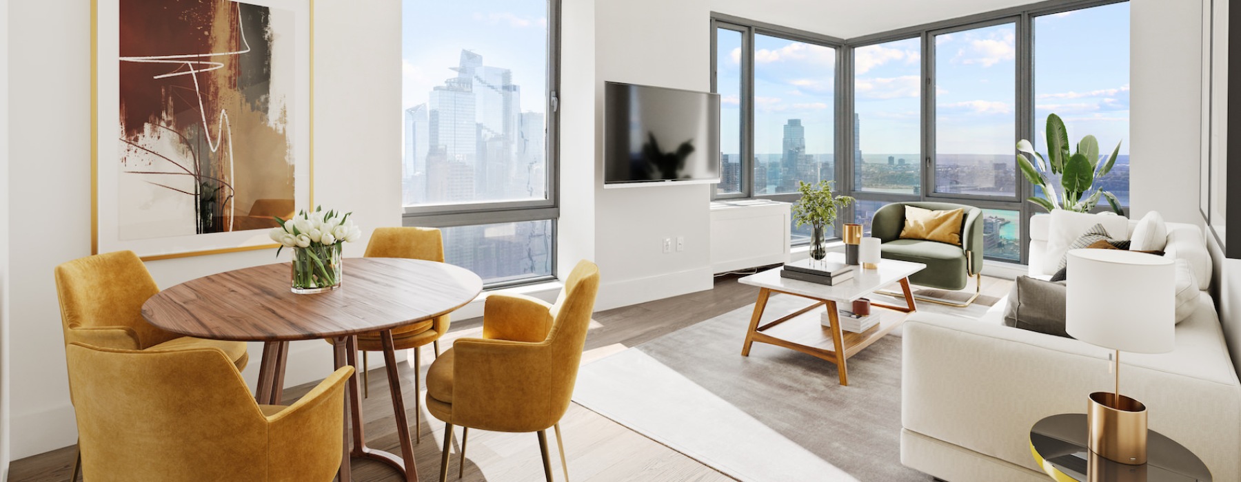 open dining and living room with round table with chairs couch and large windows