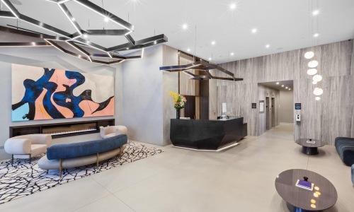 spacious lounge with modern wall art
