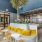 co-working lounge with seating and landscaping