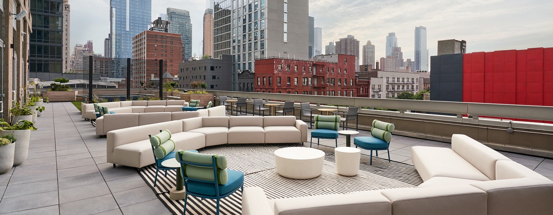 rooftop terrace area with views of downtown and with ample seating