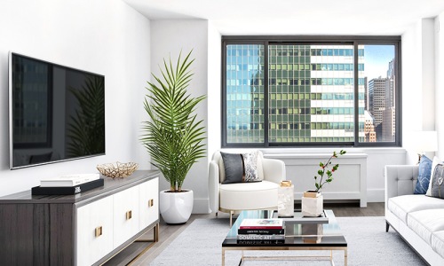 living room with built-in TV, areas for relaxing and window-views of downtown