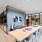communal area with a long wooden table and modern decor